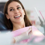 Emergency dentist in Port Coquitlam examining a patient with tooth pain at New Beam Dental