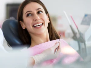 Emergency dentist in Port Coquitlam examining a patient with tooth pain at New Beam Dental